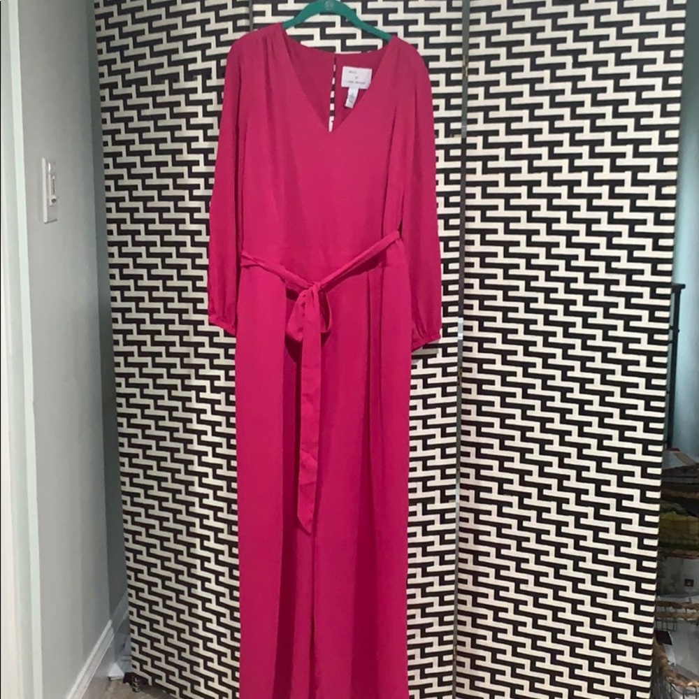 Beautiful Pink Jumpsuit, Never worn. Fits more like a size 16
